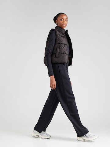 Wide leg Pantaloni 'PHNX FLC' di Nike Sportswear in nero
