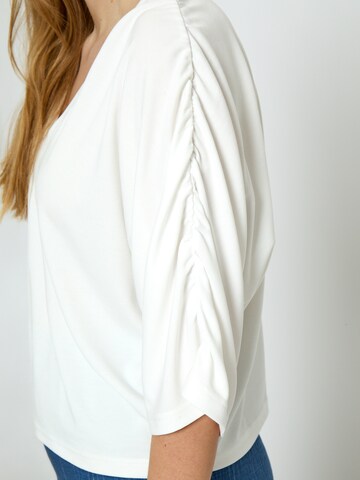 Top 'Triniti' di minus in bianco