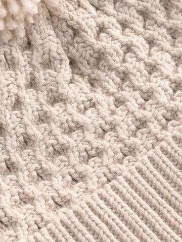 Berretto di Next in beige