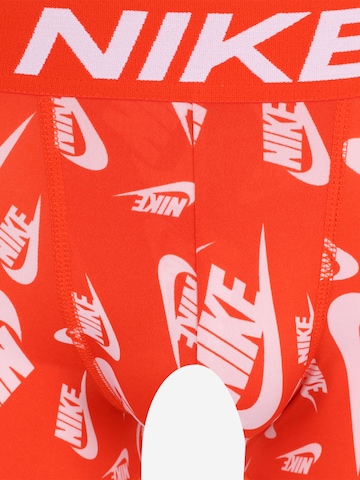 NIKE Sporttrosa i orange