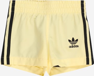 ADIDAS ORIGINALS Normalny krój Spodnie sportowe 'Adicolor 3-Stripes' w kolorze żółty: przód