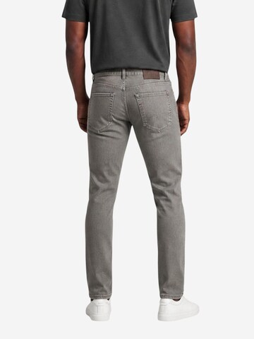 Slimfit Jeans 'XM000070 AF27185' di ARMANI EXCHANGE in beige