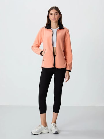 Tommy Life Fleece jas in Oranje