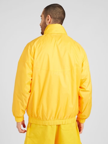 Nike Sportswear Between-Season Jacket 'Windrunner' in Yellow