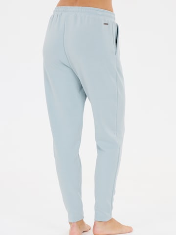 Athlecia - Tapered Pantalón deportivo 'Jacey' en azul