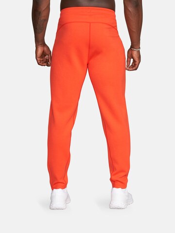 GOLD´S GYM APPAREL Tapered Sports trousers 'Eric' in Red