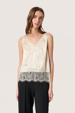 SOAKED IN LUXURY Overdel i beige: forside