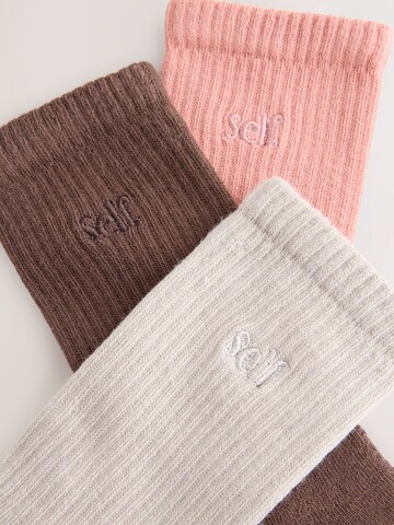 self. Socks in Beige