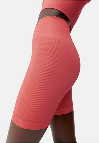 Skinny Pantalon de sport 'Urdhva' Born Living Yoga en rose
