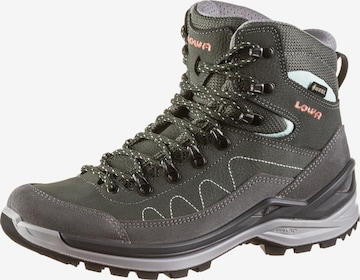 LOWA Boots in Green: front