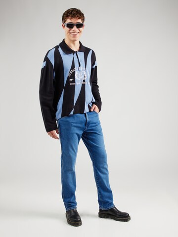 Coupe slim Jean 'TEXAS SLIM' WRANGLER en bleu
