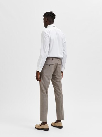 SELECTED HOMME Regular Trousers with creases 'Liam' in Brown