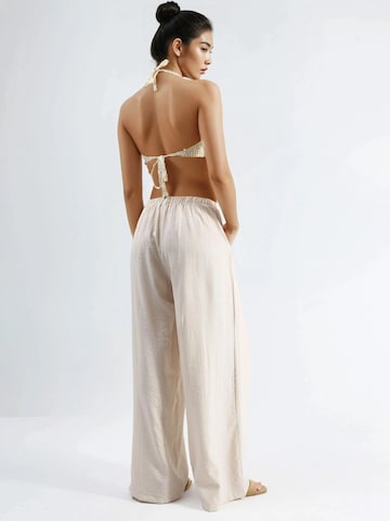 Wide leg Pantaloni con pieghe di Busem in beige