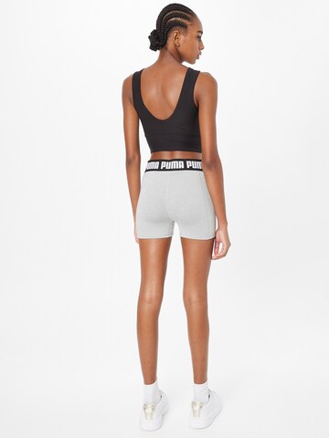 PUMA Skinny Sports trousers in Grey