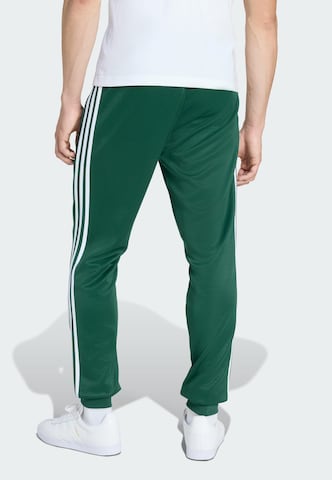 Effilé Pantalon fonctionnel 'Sst' ADIDAS ORIGINALS en vert