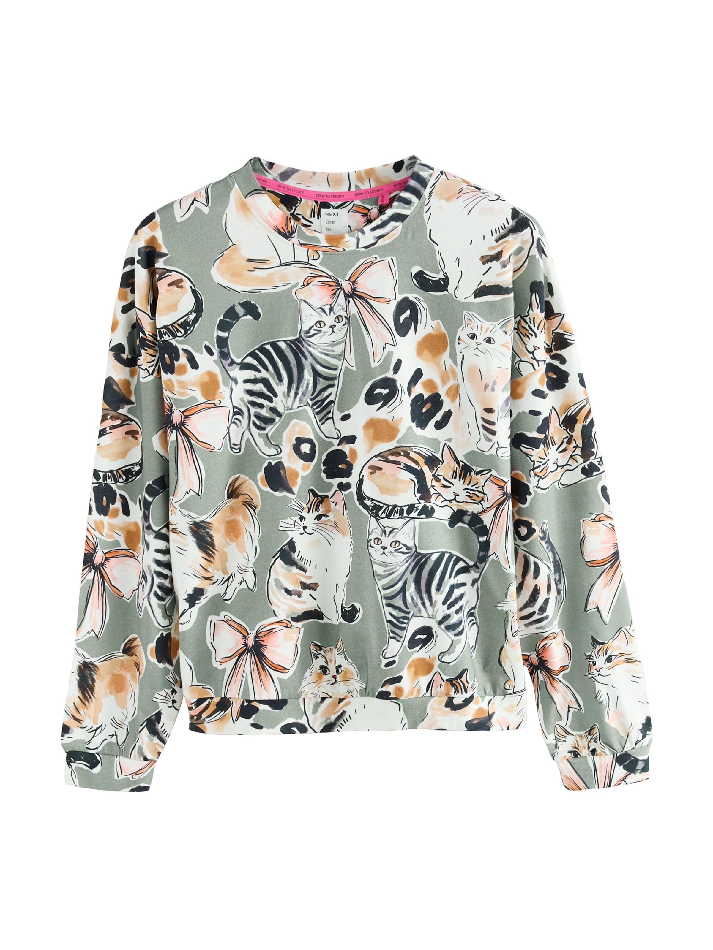 Pijama de la Next pe verde