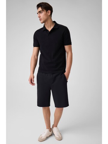 GUESS Poloshirt in Schwarz