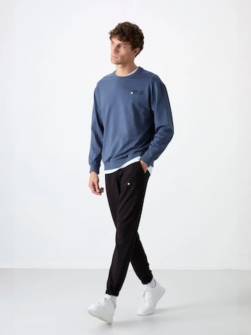 Survêtement Tommy Life en bleu : devant