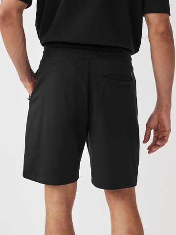 Loosefit Pantaloni di Next in nero