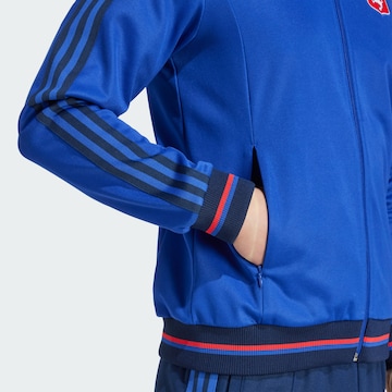Veste de survêtement 'Olympique Lyon Anniversary' ADIDAS ORIGINALS en bleu