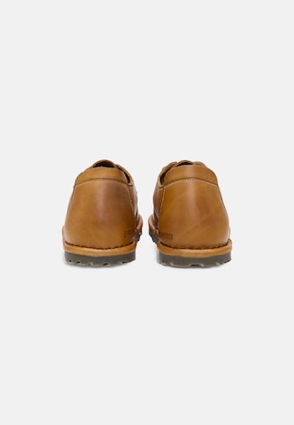 BIRKENSTOCK - Mocasines 'Utti' en marrón