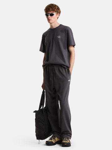 THE NORTH FACE Póló 'FLOWER SCRIBBLE' - fekete