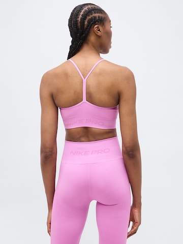 NIKE Korzet Športová podprsenka - Ružová