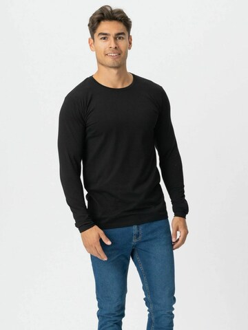 Coupe regular Chemise ' Long-sleeved ' TEESHOPPEN en noir : devant
