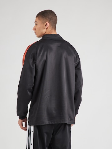 Maglietta di ADIDAS ORIGINALS in nero