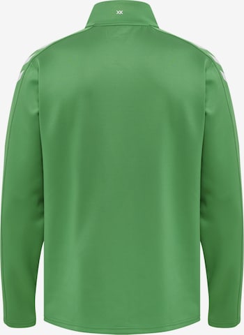 Hummel Urheilullinen collegetakki värissä vihreä