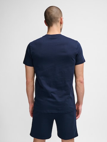 T-Shirt fonctionnel Hummel en bleu