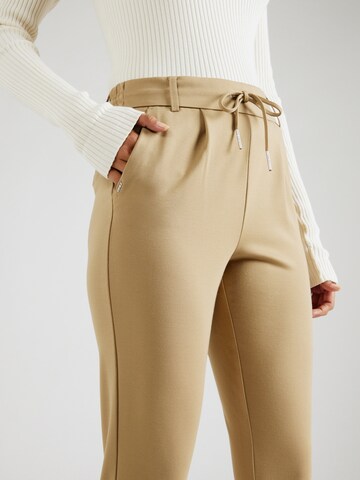 Slimfit Pantaloni con pieghe 'Poptrash' di ONLY in beige