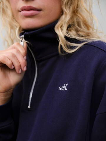 Sweat-shirt self. en bleu