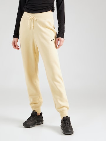 Effilé Pantalon 'Phoenix Fleece' Nike Sportswear en jaune : devant