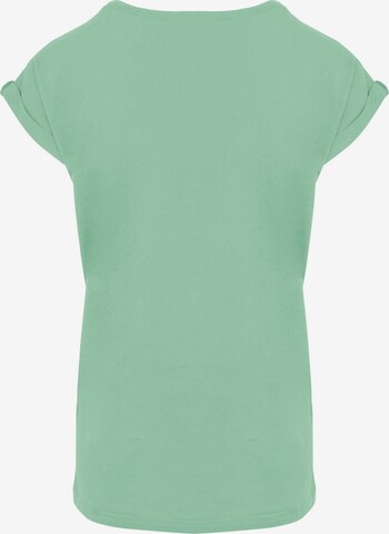 Merchcode T-Shirt 'Layla Dance' in Grün
