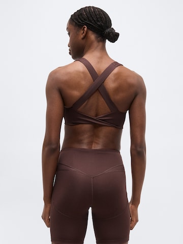 PUMA Bustier Biustonosz sportowy 'SUNDAY BLISS' w kolorze brązowy