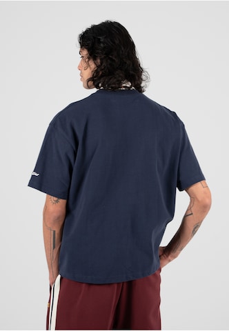 Maglietta 'Clubhouse' di Prohibited in blu