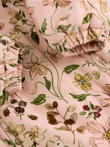 Ensemble Next en rose