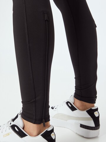 PUMA Skinny Sporthose in Schwarz