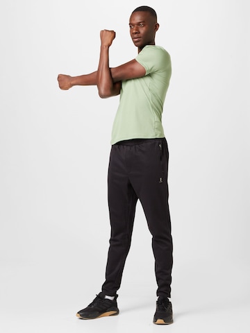 Hummel Slimfit Spodnie sportowe w kolorze czarny