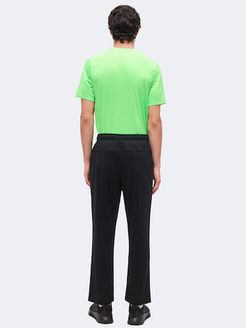 NIKE regular Παντελόνι φόρμας 'FLEX' σε μαύρο