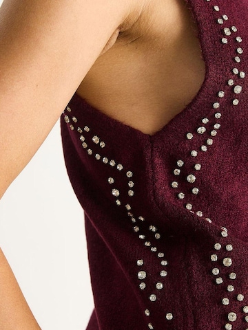 Top in maglia di Bianco Lucci in rosso