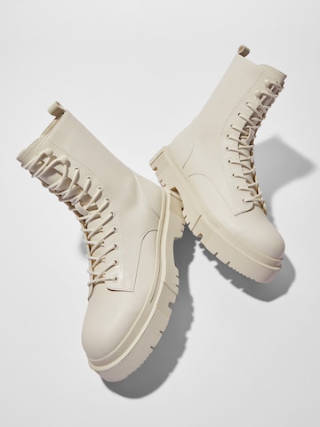 Bershka Lace-Up Boots in White