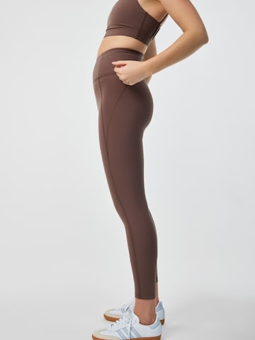 Skinny Pantalon de sport Girlfriend Collective en rose