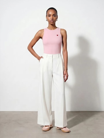 Top di Dilvin in rosa