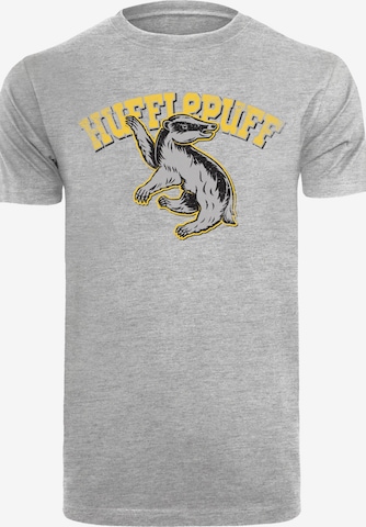 Maglietta 'Harry Potter Hufflepuff Sport Emblem' di F4NT4STIC in grigio: frontale