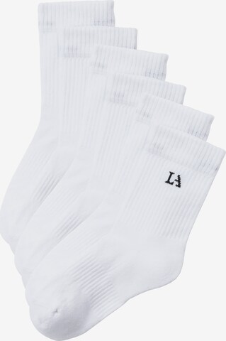 Chaussettes de sport LASCANA ACTIVE en blanc