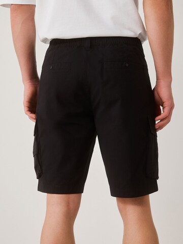 Next Normální Kapsáče – černá