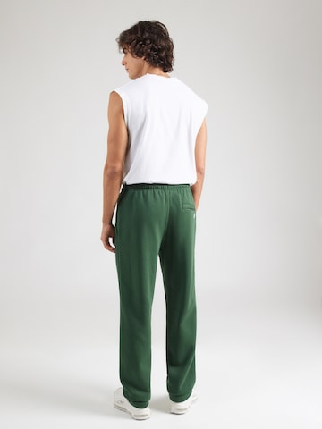 Nike Sportswear Tapered Trousers 'Club' in Green