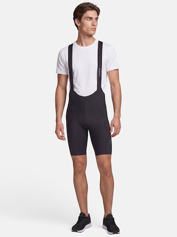 ENDURA Slim fit Workout Pants 'Alltrack' in Black: front